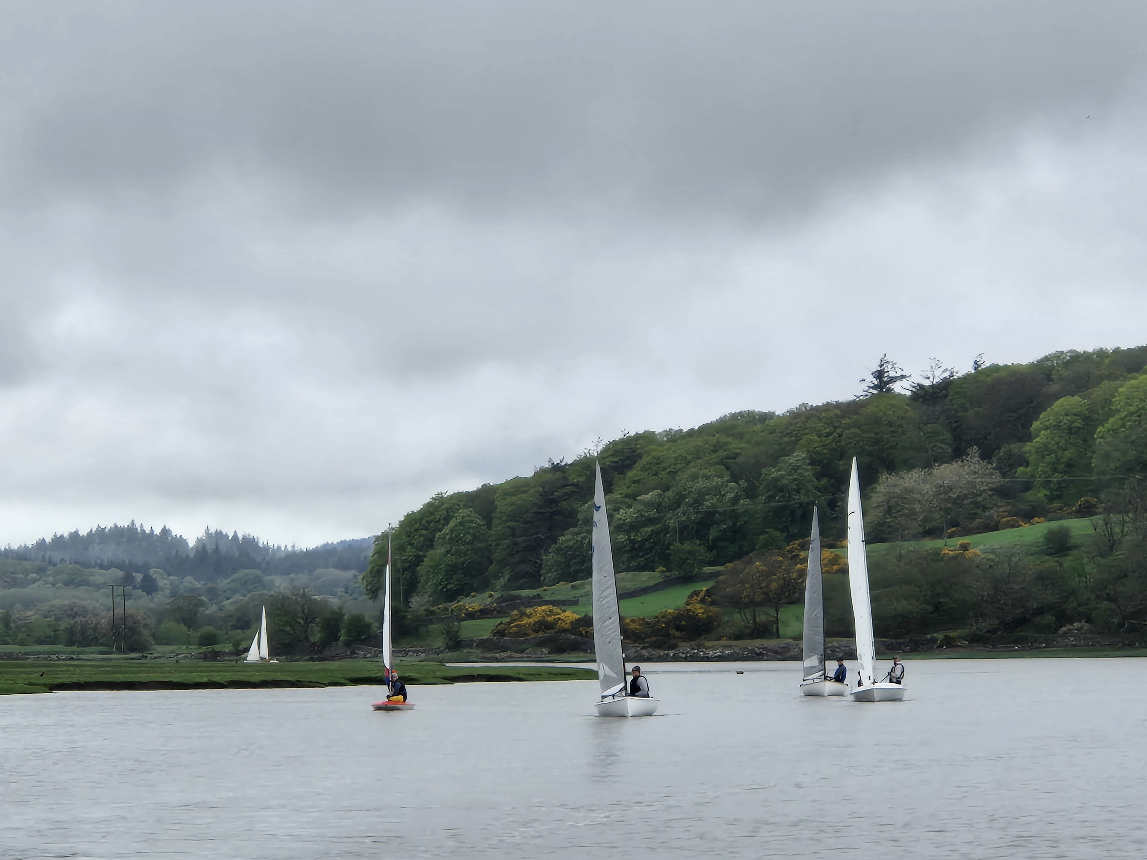 Light winds close racing, leader at the first Lucy Leyshon in Topper on left, next Stewart Mitchell, Keith Veasey both in Finns, far right eventual winners Colin Filer and Jamie Gascoigne in flying fifteen.